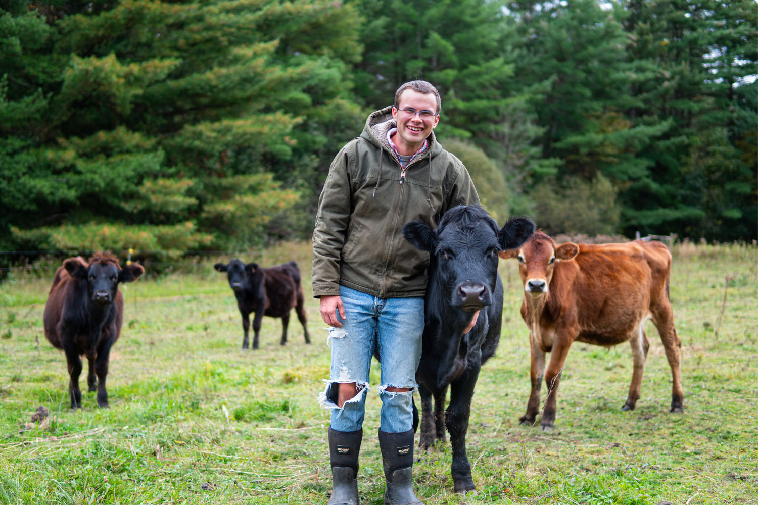 Malachi and four of his cattle